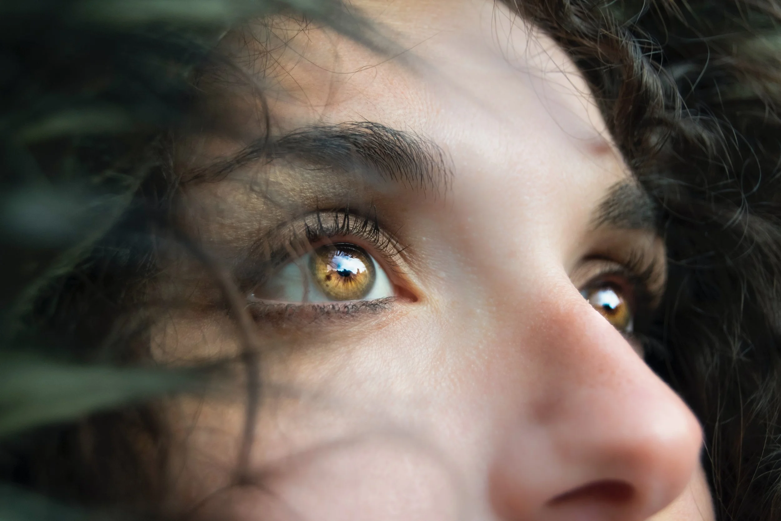  Close up of women's hazel eyes. Representing the importance of eye movement to help bring out the benefits of EMDR therapy in Denver, Colorado. Start meeting with the best EMDR therapist in Denver to start your healing. 